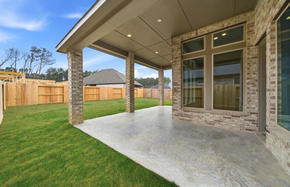 Exterior details and patio area of a home in The Highlands 55′, Porter (Image 4).