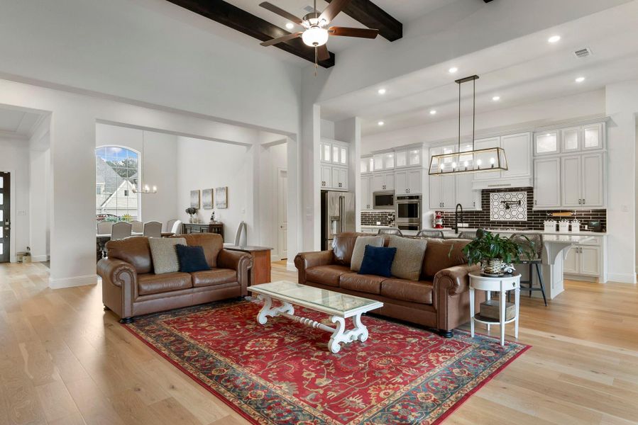 The open-concept kitchen and family room create a warm and inviting gathering space.