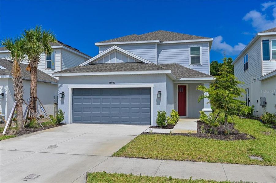 Front exterior of a new home in , Nokomis, FL, highlighting curb appeal (Image 18).