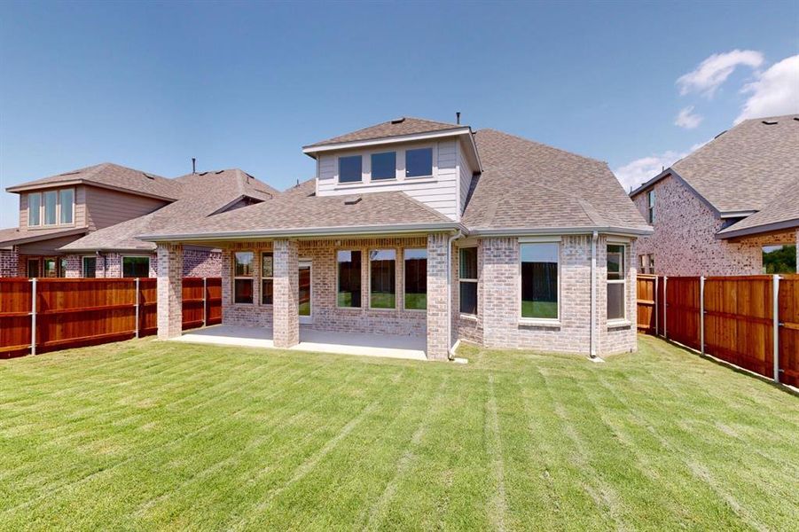 Front exterior of a new home in Lilybrooke at Legacy Hills, Celina, TX, highlighting curb appeal (Image 19). Front exterior of a new home in Lilybrooke at Legacy Hills, Celina, TX, highlighting curb appeal (Image 19).