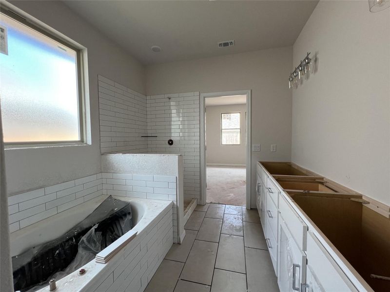 In-progress construction of a new home in Rolling Glen, Hutto, TX (Image 22).