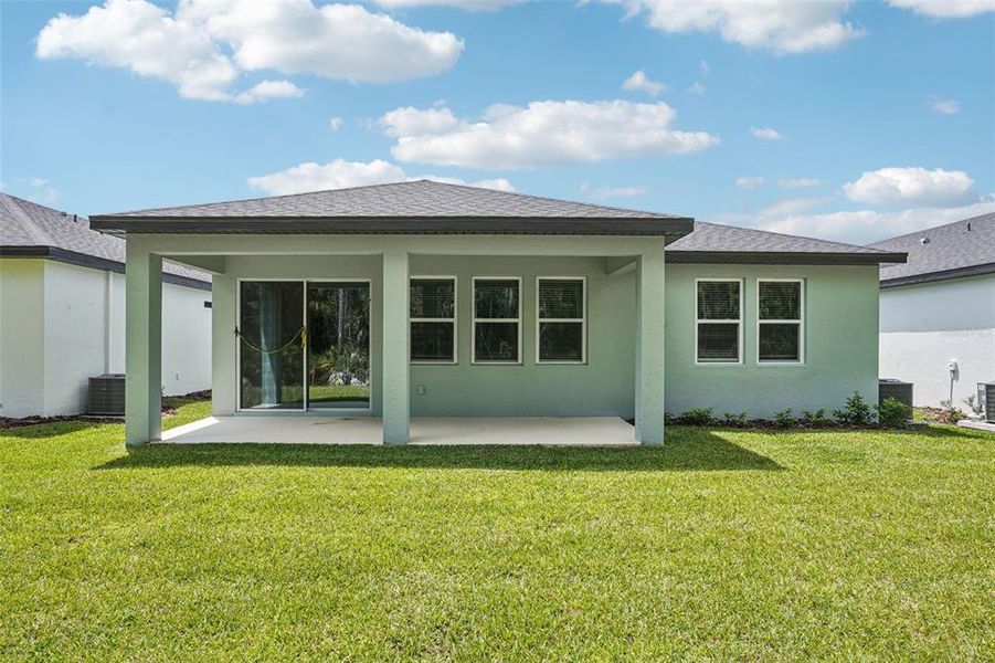 Exterior details and patio area of a home in Ridgehaven - Signature Series, Ormond Beach (Image 2).