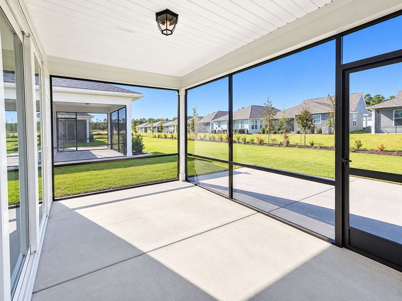 Exterior details and patio area of a home in Del Webb Wilmington at Mallory Creek, Leland (Image 13).