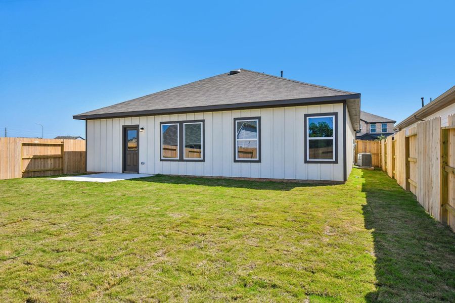 The backyard is designed for family living and outdoor enjoyment.
