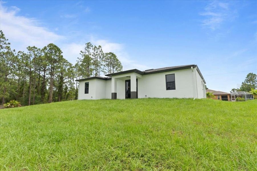 Exterior details and patio area of a home in , Lehigh Acres (Image 15).