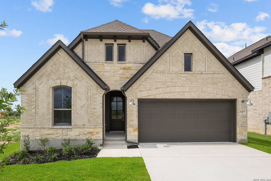 Front exterior of a new home in Nopal Valley, San Antonio, TX, highlighting curb appeal (Image 26). Front exterior of a new home in Nopal Valley, San Antonio, TX, highlighting curb appeal (Image 26).