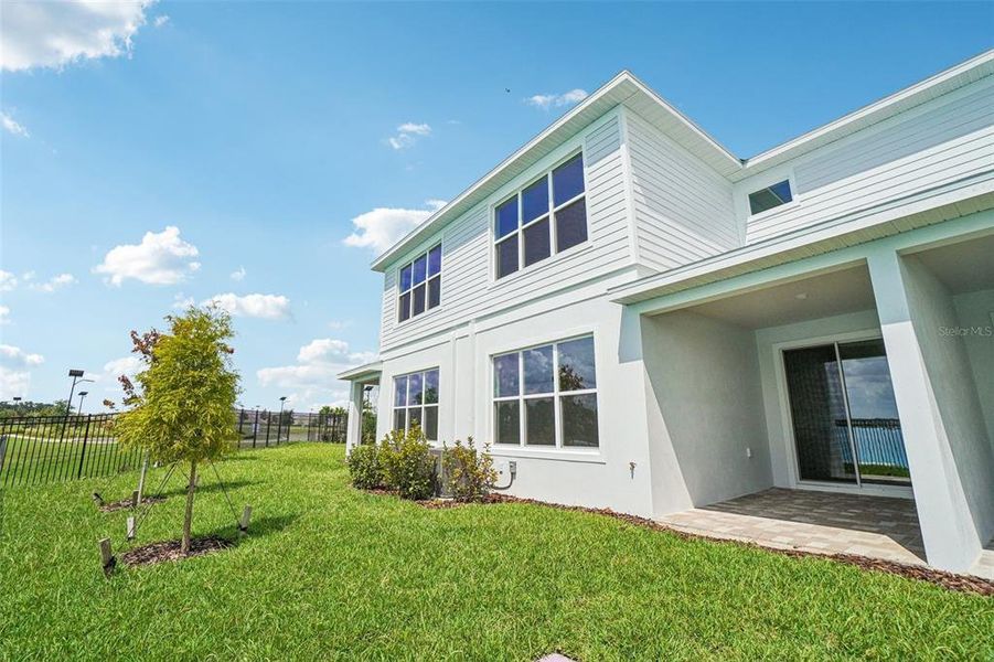 Front exterior of a new home in Isla Mirada, San Antonio, FL, highlighting curb appeal (Image 28).