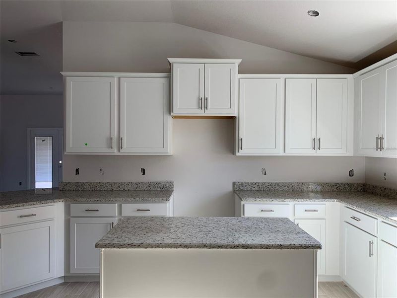 Actual kitchen- white shaker cabinets w/granite