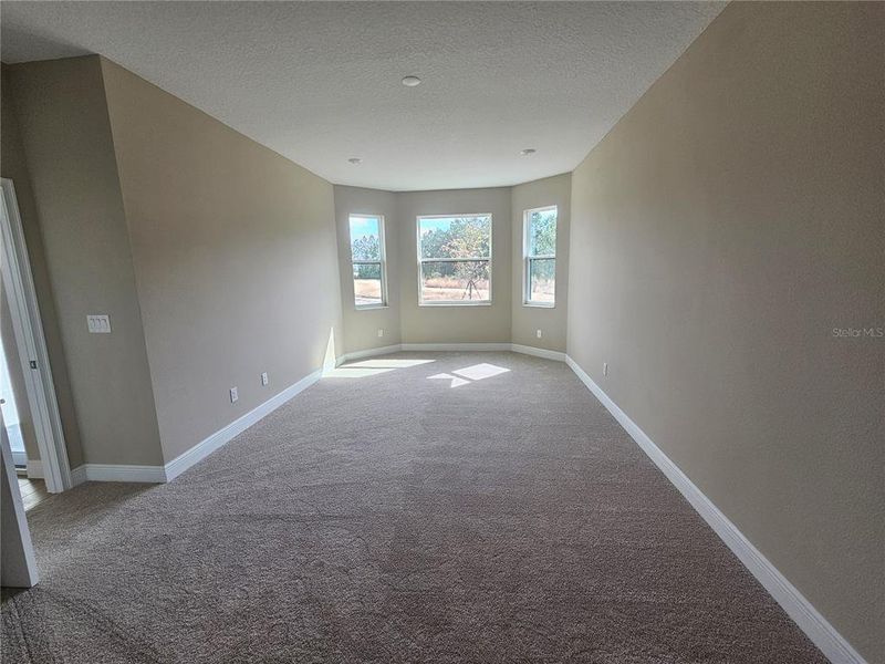 Spacious, unfurnished interior of a new home in Tamarack at Two Rivers, Zephyrhills (Image 6). Spacious, unfurnished interior of a new home in Tamarack at Two Rivers, Zephyrhills (Image 6).