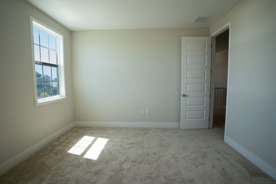 Representative unfurnished interior of a home built from the Orion by Maronda Homes in The Vue, Satellite Beach (Image 19).
