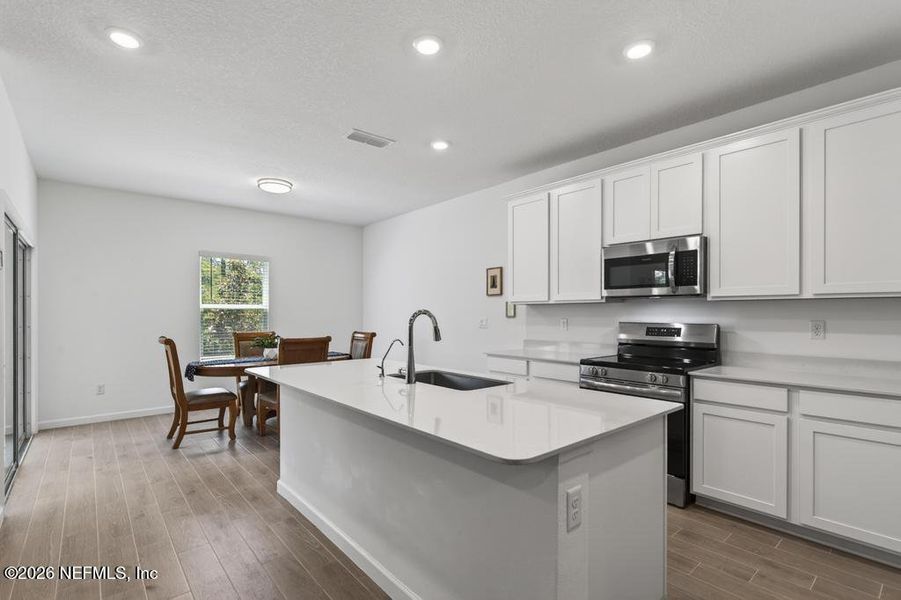 Furnished interior view inside a new home in St Augustine Lakes, St. Augustine (Image 9).