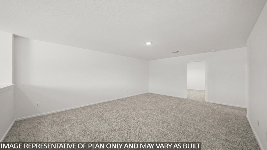 Carpeted empty room with baseboards