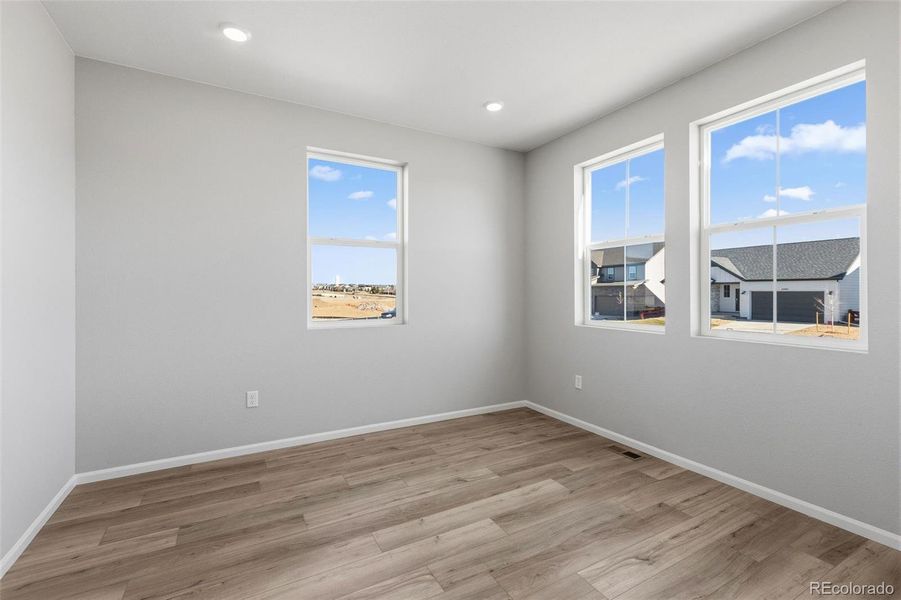 Spacious, unfurnished interior of a new home in The Estates Collection at Talon Pointe, Thornton (Image 18).
