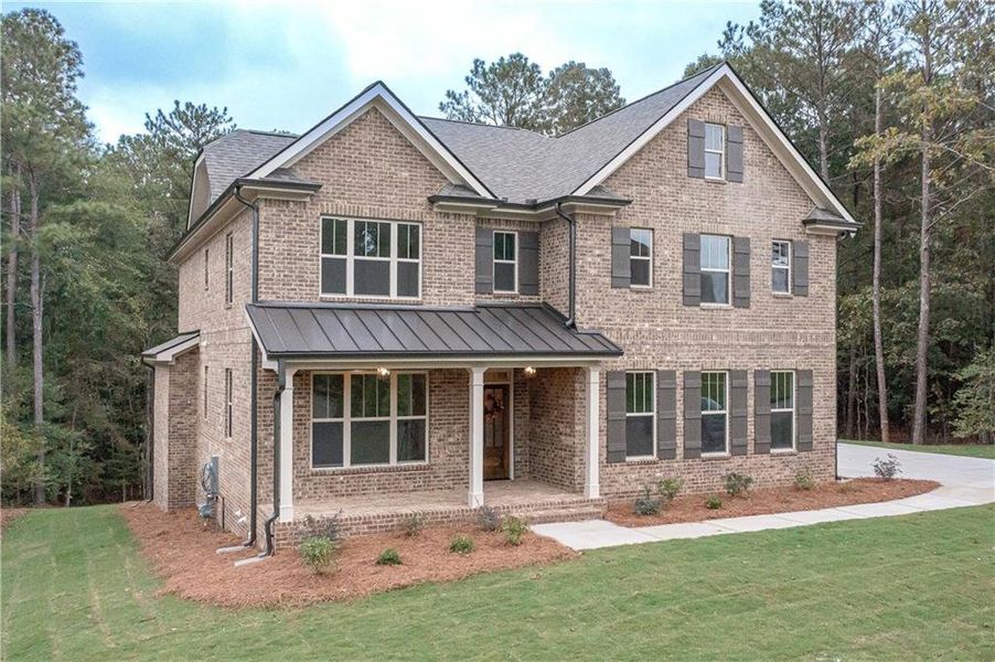 Front exterior of a new home in , Douglasville, GA, highlighting curb appeal (Image 2). Front exterior of a new home in , Douglasville, GA, highlighting curb appeal (Image 2).