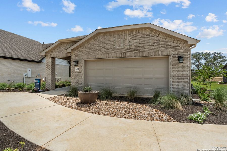 Front exterior of a new home in Del Webb New Braunfels at Veramendi, New Braunfels, TX, highlighting curb appeal (Image 2).