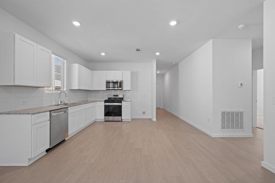 Furnished interior view inside a new home in Crosby Farms, Crosby (Image 6).