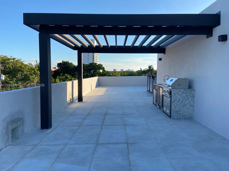 Exterior details and patio area of a home in , Miami (Image 12).