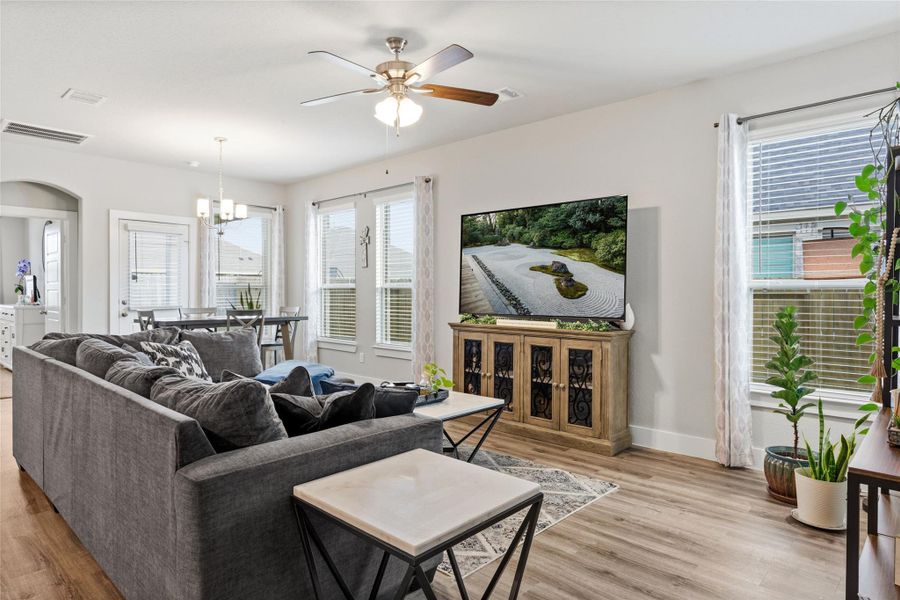 Spacious and inviting living room with abundant natural light, modern finishes, and an open layout perfect for relaxation and entertaining. Spacious and inviting living room with abundant natural light, modern finishes, and an open layout perfect for relaxation and entertaining.