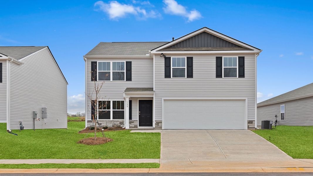 Front exterior of a new home in Bentley Park, Greenwood, SC, highlighting curb appeal (Image 1). Front exterior of a new home in Bentley Park, Greenwood, SC, highlighting curb appeal (Image 1).