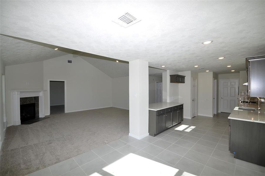 Breakfast room back into the fancily and the remotely controlled fireplace,.