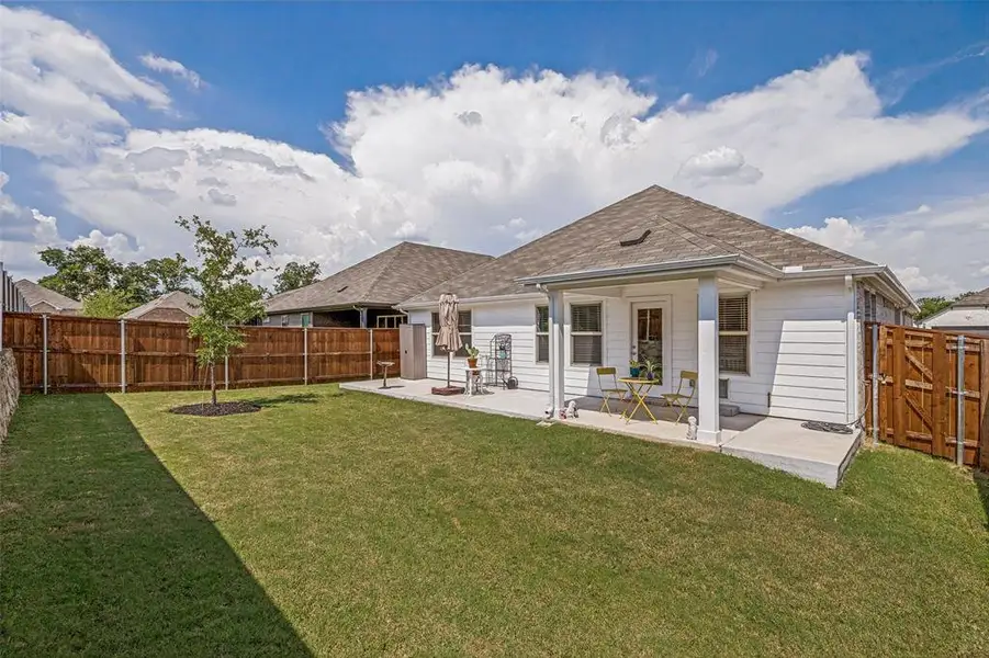 Exterior details and patio area of a home in Lakehaven - Signature Series, Farmersville (Image 21). Exterior details and patio area of a home in Lakehaven - Signature Series, Farmersville (Image 21).