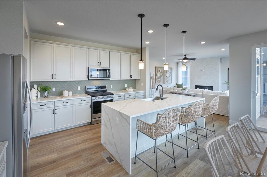 Furnished interior view inside a new home in The Aurora Highlands, Aurora (Image 18).