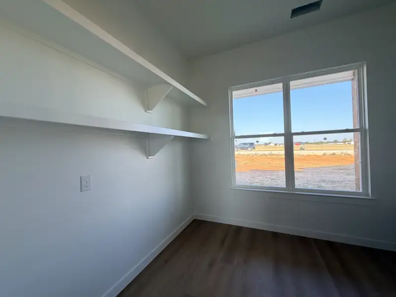 Spacious, unfurnished interior of a new home in Parallel Pastures, Poolville (Image 16).