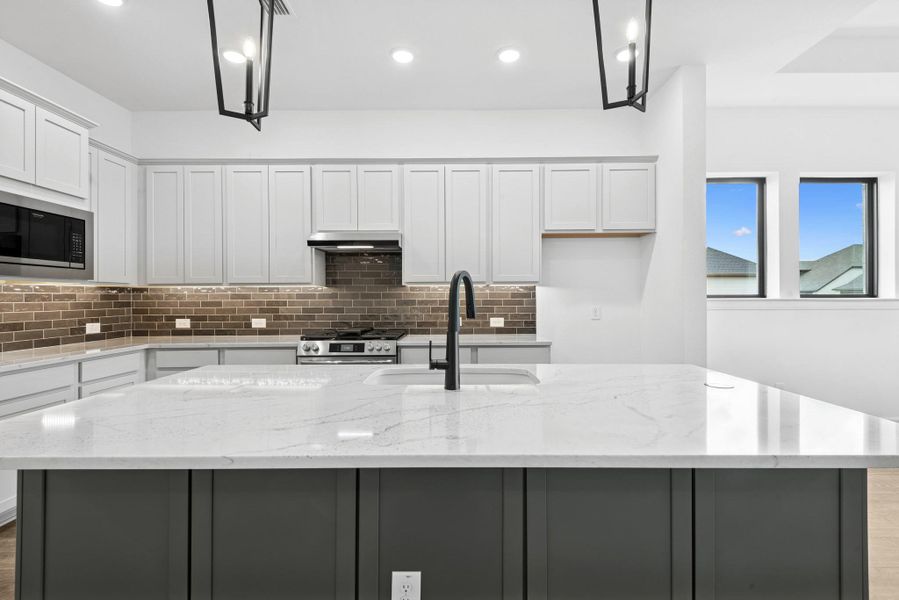Furnished interior view inside a new home in Riceland - Enclave Row Collection, Mont Belvieu (Image 3).