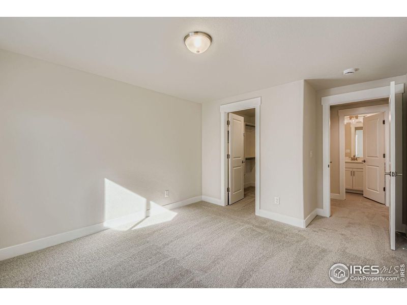 Spacious, unfurnished interior of a new home in RainDance National 60/70, Windsor (Image 23).