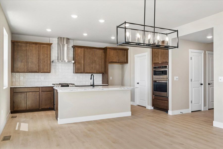 Furnished interior view inside a new home in The Trails at Aspen Ridge, Colorado Springs (Image 5).
