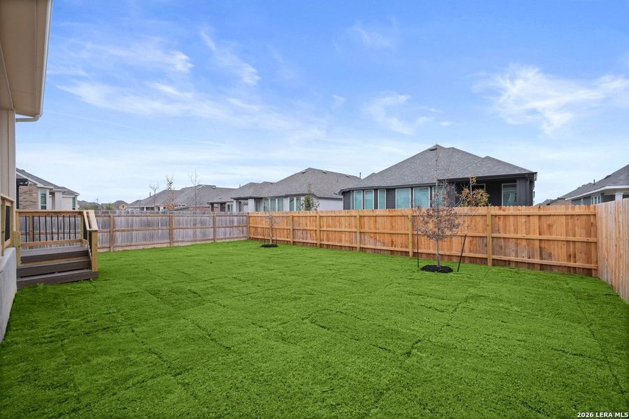 Exterior details and patio area of a home in Davis Ranch, San Antonio (Image 23).
