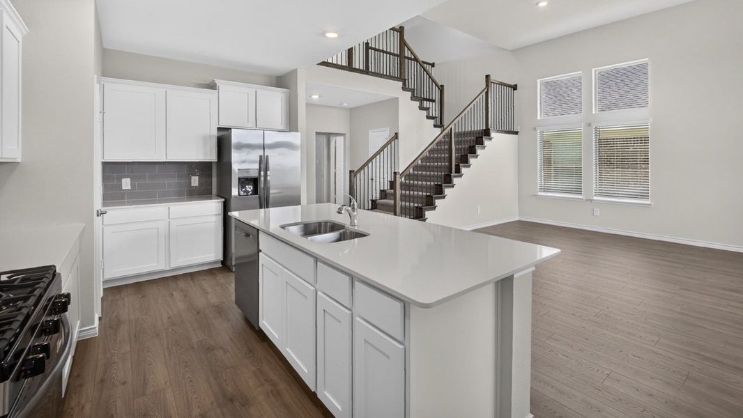 Representative furnished interior of a home built from the H233 Alpine by D.R. Horton in Lilybrooke at Legacy Hills, Celina (Image 4).
