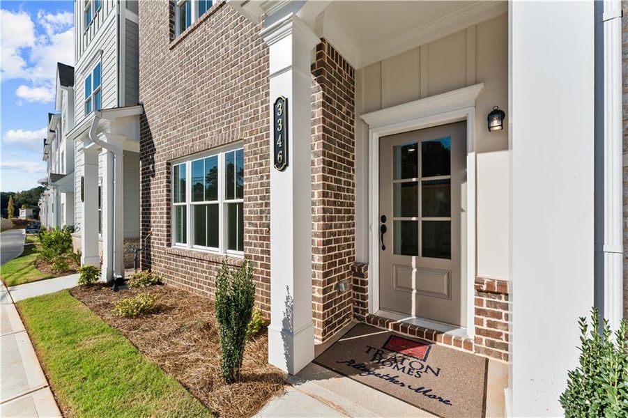 Exterior details and patio area of a home in East Park Village, Kennesaw (Image 3). Exterior details and patio area of a home in East Park Village, Kennesaw (Image 3).