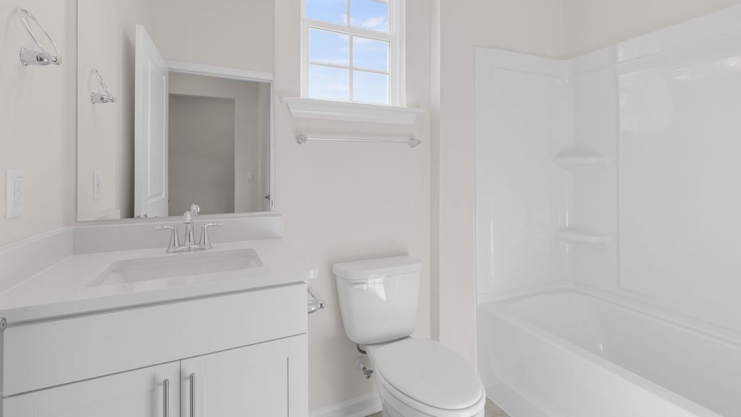 Furnished interior view inside a new home in The Villas at Kinsley, Jamestown (Image 3).