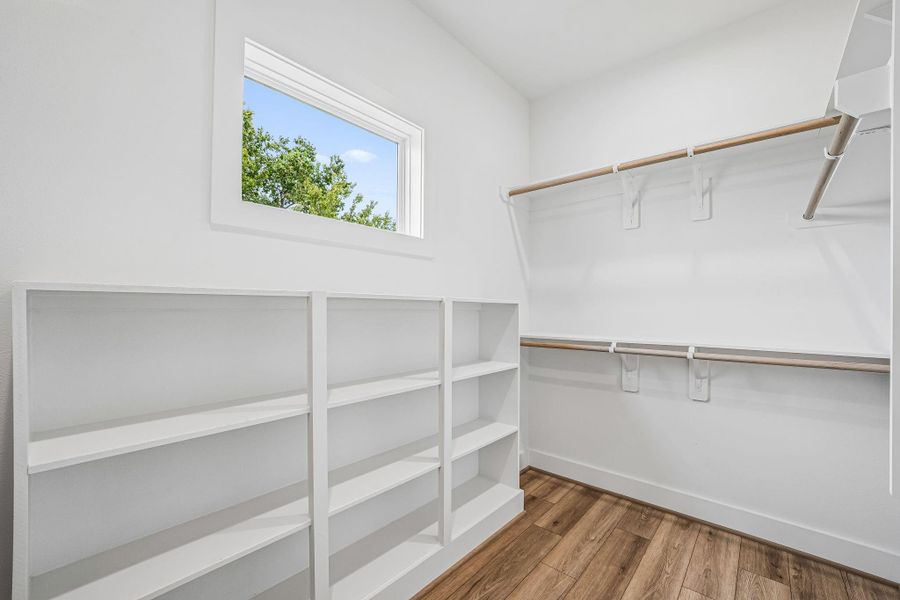 Primary Bedroom has his and her closet. Both with built-ins.