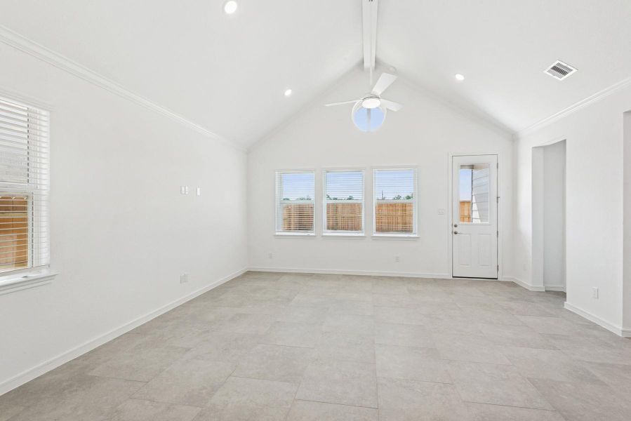 Sun-lit great room and dining area Sun-lit great room and dining area