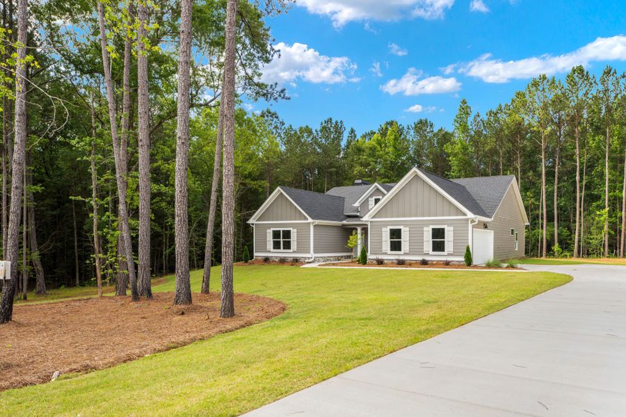 Front exterior of a new home in Flint Farms, Concord, GA, highlighting curb appeal (Image 22).
