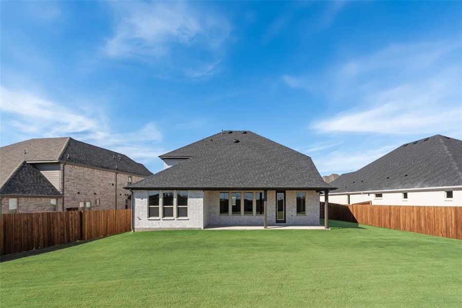 Exterior details and patio area of a home in Arbors at Legacy Hills, Celina (Image 3).