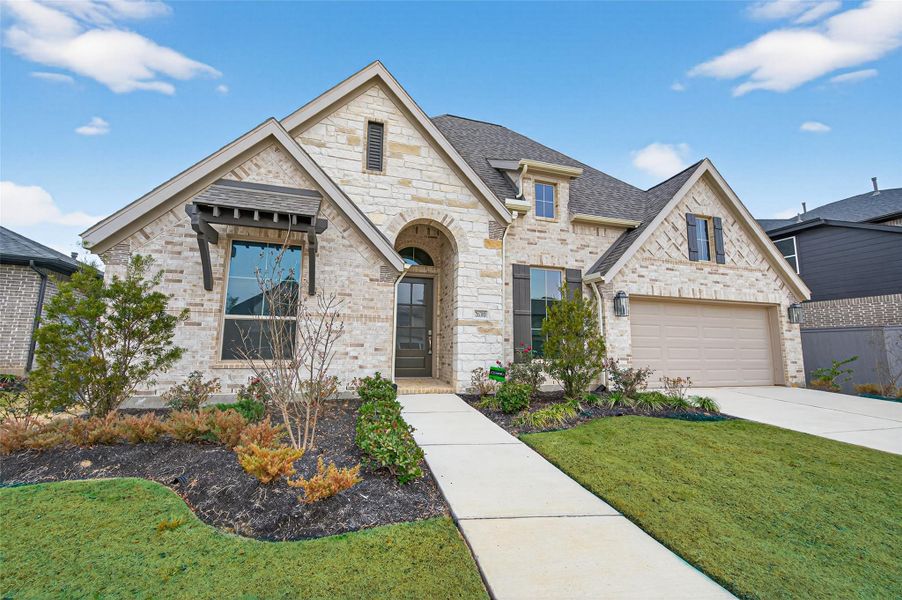 Front exterior of a new home in , Hockley, TX, highlighting curb appeal (Image 25). Front exterior of a new home in , Hockley, TX, highlighting curb appeal (Image 25).