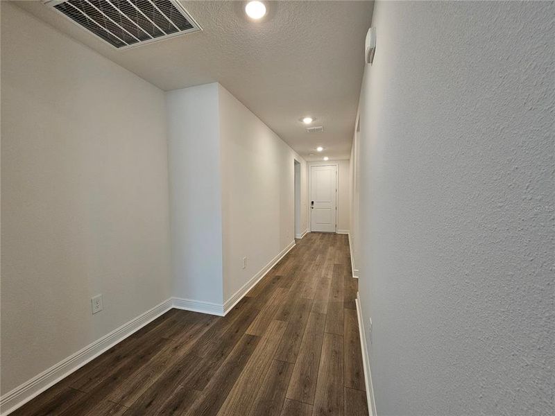 Spacious, unfurnished interior of a new home in The Reserve at Hammock Oaks - Signature Series, Lady Lake (Image 16).