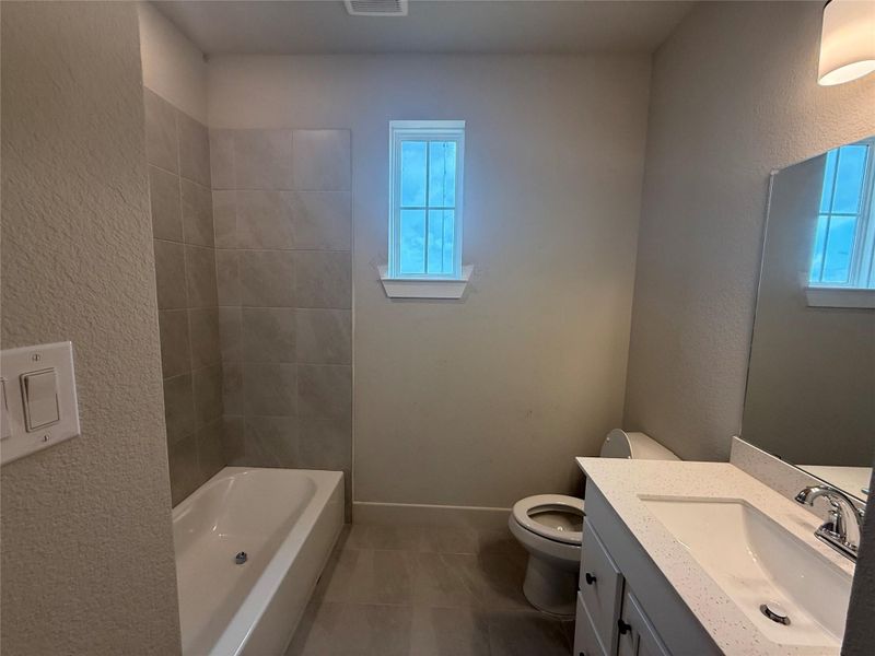 You'll enjoy the full bath included in the private guest suite.