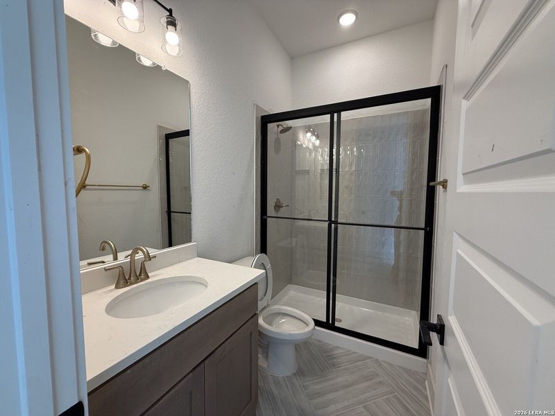 Furnished interior view inside a new home in Caliza Reserve, Boerne (Image 8).