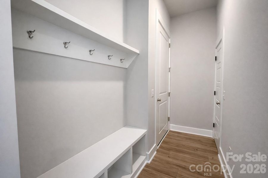 3-Car Garage Entry + Under Stairs Storage + Dropzone