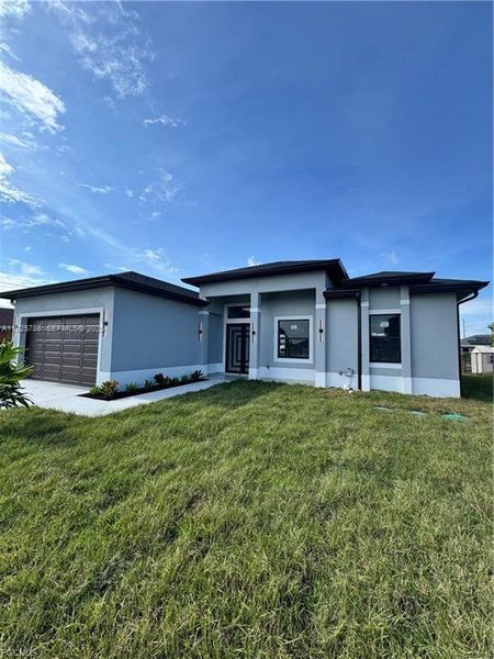 Exterior details and patio area of a home in , Lehigh Acres (Image 15). Exterior details and patio area of a home in , Lehigh Acres (Image 15).