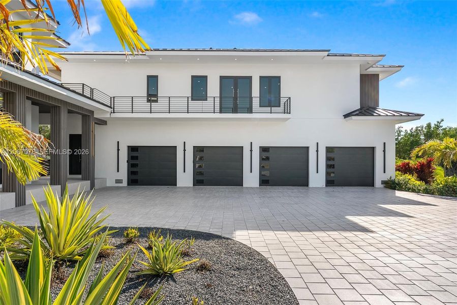 Front exterior of a new home in , Marathon, FL, highlighting curb appeal (Image 2). Front exterior of a new home in , Marathon, FL, highlighting curb appeal (Image 2).
