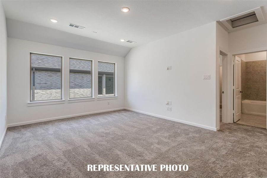 Lots of family fun time is waiting to be had in this spacious, light filled game room!  REPRESENTATIVE PHOTO