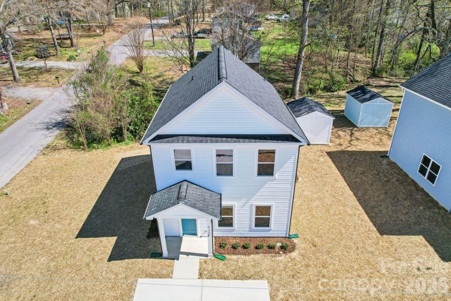 Front exterior of a new home in , Bessemer City, NC, highlighting curb appeal (Image 16).