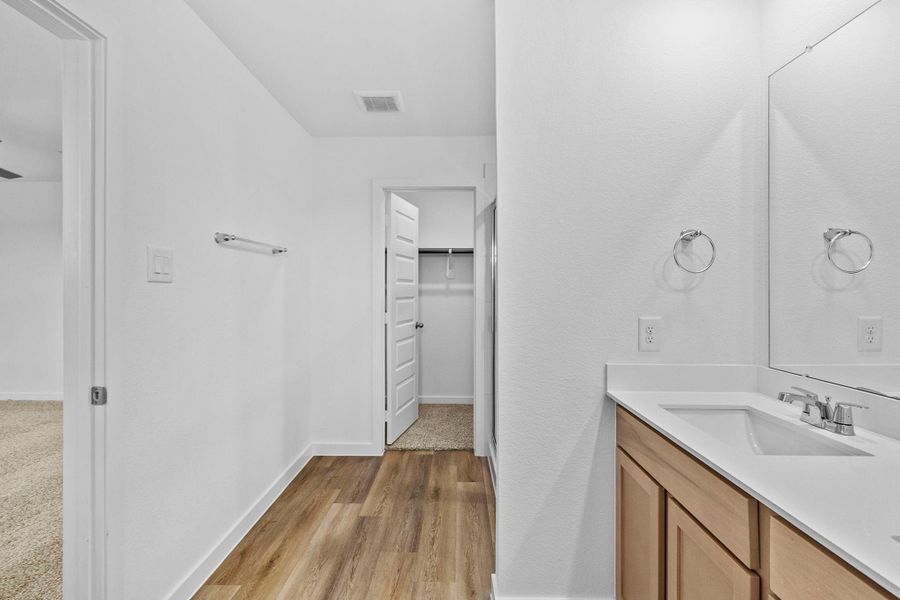 Furnished interior view inside a new home in Grand West, Houston (Image 7).