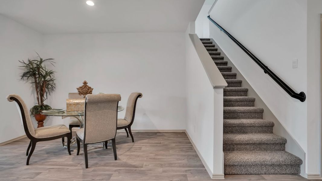 Representative furnished interior of a home built from the MITCHELL by D.R. Horton in Westward Pointe, Sealy (Image 12).