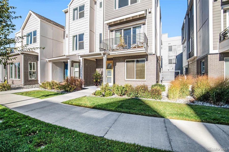 Front exterior of a new home in Prelude at TAVA Waters, Denver, CO, highlighting curb appeal (Image 23). Front exterior of a new home in Prelude at TAVA Waters, Denver, CO, highlighting curb appeal (Image 23).